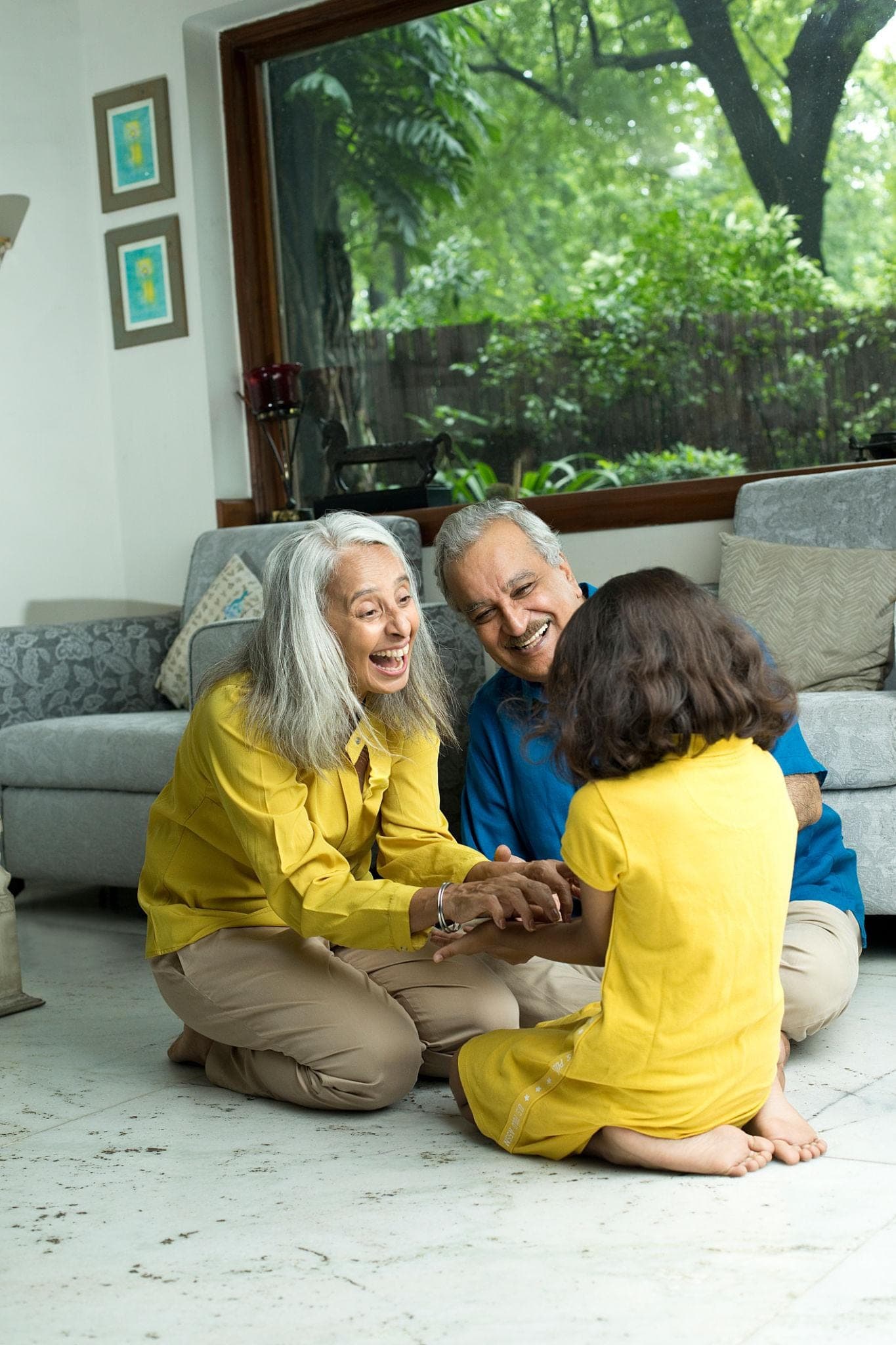 Senior surrounded by family or close friends in a natural, happy moment. elderly counseling service with A Comfortable Space to Talk  
