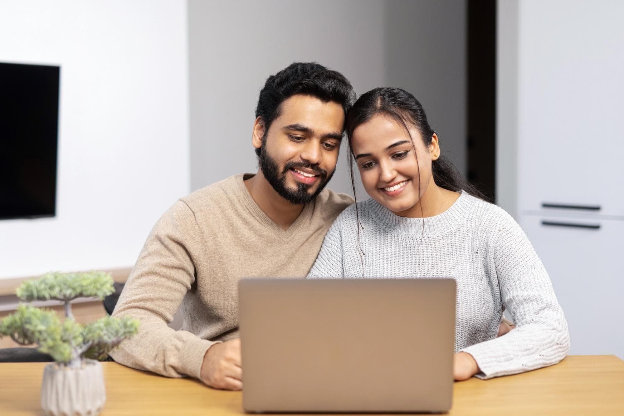 Benefits of Relationship Counselling Online Show the couple in a private, comfortable home environment, with the counselor visible naturally on the screen.
