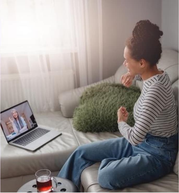 know A woman attending an online counselling session from home