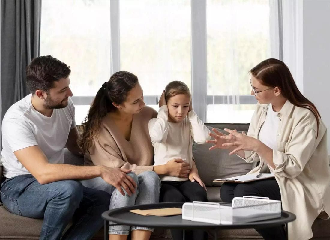 When Can Parent Child Counseling Help?, Mother, father, and child sitting together with a professional counselor. When Can Parent Child Counseling Help?, Mother, father, and child sitting together with a professional counselor.